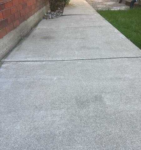 Backyard Walkway Restored After Soil Settlement