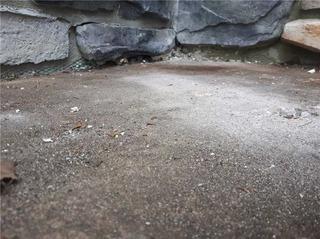 Pooling Water on Front Porch in Uxbridge, Ontario