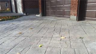 Sinking Driveway Creates Tripping Hazard in Thornhill, Ontario