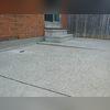 One large slab was sinking, causing a tripping hazard and guiding water towards the foundation instead of away