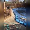 This gorgeous backyard was plagued by sinking concrete surround the pool deck