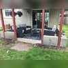 This quaint patio was tarnished by pooling water and failing concrete