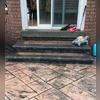 The concrete had settled so much that the steps were no longer within legal code
