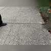 As the concrete settled it created several tripping hazards around the pool