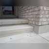 The staircase is no longer sloping forward and is much safer.
