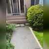The staircase walkway had started to sink making the gap underneath the first step larger.