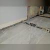 Notice the large gap from the base of the wall to the floor.