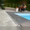 After the sealant is applied, Cameron puts colour-matched sand for a seamless finish
