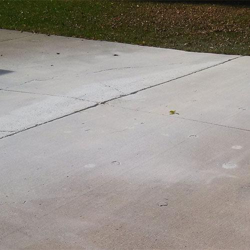 Level concrete driveway Concrete driveway after polyurethane injection