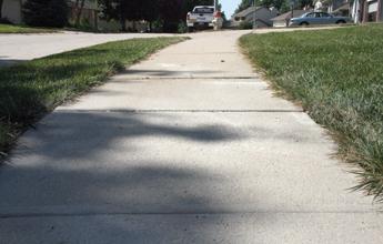Sunken sidewalk raised with polyurethane injection Sunken sidewalk raised with polyurethane injection