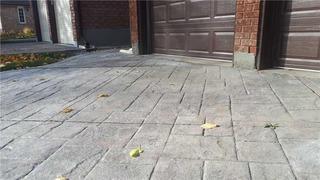 Sinking Driveway Creates Tripping Hazard in Thornhill, Ontario